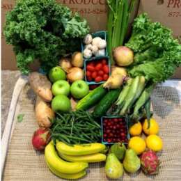 Fresh regenerative farm produce box with seasonal fruits and vegetables
